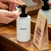 Distributeur de savon en mousse rond noir et blanc en verre transparent OEM ODM avec tablettes de savon pour les mains