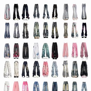 <span class=keywords><strong>Jeans</strong></span> da <span class=keywords><strong>Donna</strong></span> Stile Hip Hop Americano 2025, Nuovi Modelli a Basso Prezzo, Vintage, Larghi, in Denim con Motivo a Righe Ricamato, Vendita all'Ingrosso Estiva - Product Image 1