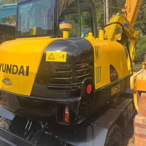 Excavatrice compacte sur roues Hyundai R60W d'occasion de <span class=keywords><strong>6</strong></span> <span class=keywords><strong>tonnes</strong></span> |   Construction Urbaine, Utilisation des Voies Routières, Aménagement Paysager, Démolition, <span class=keywords><strong>Location</strong></span> - Product Image 2