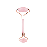 Vente en gros de rouleaux de massage faciaux sans bruit, rouleau de massage en quartz rose pour le visage et le corps