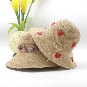 Pemasok pabrikan topi jerami wanita anyaman tangan topi jerami rafia musim panas tembus udara