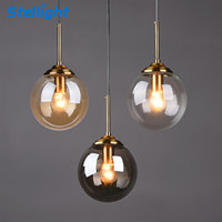 Petites lampes suspendues nordiques modernes Lustre à suspension boule ronde avec globe en verre ambré pour le salon