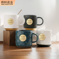 Tasse à café en céramique avec médaille en bronze gaufré de 500ml au design moderne avec logo tasse à café en céramique tasse à lait de luxe en porcelaine