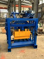 Machine à fabriquer des blocs creux en béton YaoDa QTJ 4-40 avec moteur, pression hydraulique et utilisation facile