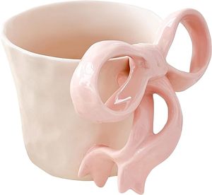 Mignonne tasse en céramique pour lait, réutilisable, avec poignée en forme de nœud, compatible lave-vaisselle et micro-ondes, pour le bureau, la maison, le café - Product Image 1