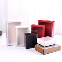 Boîte cadeau personnalisée en carton kraft noir givré avec revêtement UV et gaufrage pour l'emballage de thé, masques, mugs et biscuits