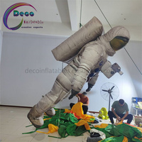 Costume de ballon d'astronaute géant gonflable pour la publicité extérieure et la promotion comprenant un ventilateur et un accessoire de transport maritime