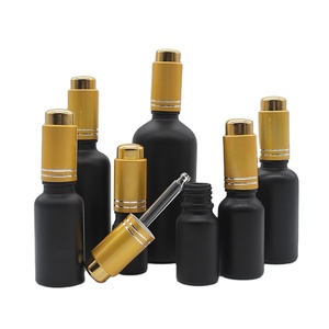 Flacone Contagocce in Vetro Nero Satinato da <span class=keywords><strong>1</strong></span> <span class=keywords><strong>oz</strong></span> con Pompa Dorata, Contenitore Vuoto per Oli Essenziali e Cosmetici - Product Image 1