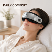 Masseur oculaire intelligent noir avec chaleur, vibrations, brume, fonction musicale, rechargeable par USB pour une relaxation oculaire et un soulagement du stress à domicile