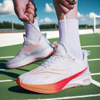Chaussures de sport pour hommes, tendance mode, pour l'entraînement au football, design compétition, amortissantes, ultra-légères, chaussures de sport décontractées