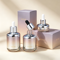 Flacon compte-gouttes en verre argenté métallisé, flacon de sérum de luxe à base lourde, flacon d'huile essentielle chromé avec logo personnalisé, emballage