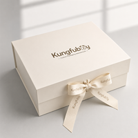 Caja de Regalo Plegable Rígida de Color Marfil para Bebés, con Lazo de Cinta, para Sets de Regalo de Boutique, Embalaje OEM Personalizado para Comercio Electrónico