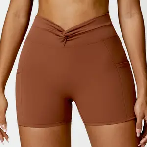Damen Rücken V Stitching Dritte Länge Front geknotete Workout Shorts Atmungsaktive Quick Dry 2024 Side Phone Pockets Gym Shorts