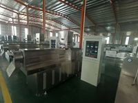 Machine automatique d'extrusion de snacks à double vis pour produits céréaliers, type pop-corn et gâteaux de riz, machine à faire des gâteaux de riz soufflés et des snacks.