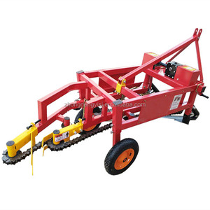 Venta al por mayor de maquinaria agrícola: Mini cosechadora de ajo y cacahuete de 8-15HP con tractor de arrastre y suspensión, fabricada en China - Product Image 1