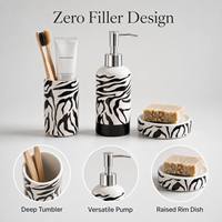 Ensemble de salle de bain 3 pièces en céramique noire et blanche à imprimé zèbre CF Statement : distributeur de savon, porte-brosse à dents et porte-savon pour comptoir
