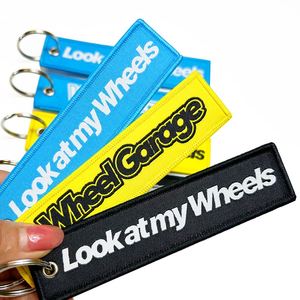 Promotional Wholesale Custom Brand Name Travel Souvenir Woven Embroidery Logo Fabric Keychains - Product Image 4