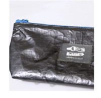 Vente en gros de sacs cosmétiques en papier kraft Tyvek avec logo personnalisé, sacs à fermeture éclair Tyvek écologiques réutilisables pour le rangement