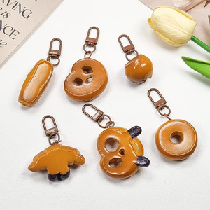 Carino 3D divertente giocattolo cibo pane in resina portachiavi cibo cartone animato Bagel Bagel pane Pretzel custodia per telefono Charm borsa ciondolo portachiavi auto - Product Image 4