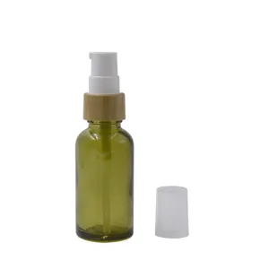 30ml Kosmetik verpackung umwelt freundliche tee grüne ätherische Öl flasche mit bambus überzogener weißer Lotion pumpe