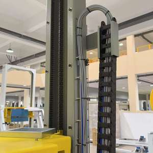 Machine d'emballage automatique de palettes haut de gamme avec entraînement à couple élevé, chargement rapide des sangles, emballage de boîtes en carton ondulé et de charges lourdes - Product Image 6