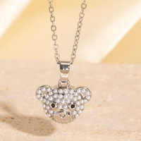 Bijoux de perles en acier inoxydable pour femmes incrustés de cuivre Imitation perle ours et pendentif panda conception non décolorée et creuse