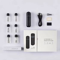 Diffuseur d'arômes électrique automatique pour voiture rechargeable par USB en gros, mini diffuseur d'huiles essentielles pour voiture, diffuseur d'arômes pour grille d'aération de voiture