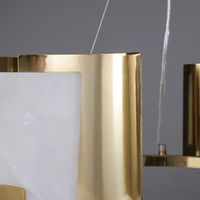 Lampe suspendue en laiton postmoderne personnalisée Yihao, luminaire de luxe pour le salon, lustre nordique, plafond en marbre naturel