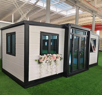 Maison conteneur extensible de luxe moderne de 20 pieds et 40 pieds avec salle de bain complète, mur de verre préfabriqué, prix raisonnable, en acier pour usage en boutique