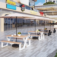 Table à manger extérieure moderne en fer et en bois massif pour les cafés, les magasins de thé au lait, les cours