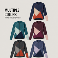 Maillot de cyclisme personnalisé pour femme à manches longues et fermeture éclair intégrale, motif géométrique color block, idéal pour les compétitions de cyclisme sur route