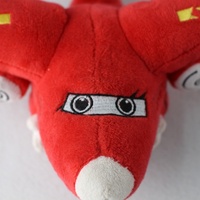 Avion en peluche rouge doux et réaliste avec votre logo