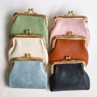Portefeuille unisexe en PU vintage tendance, à fermeture kiss-lock, grande capacité, durable, nouveau modèle très vendu