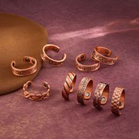 YL Vente chaude transfrontalière Bague unisexe ouverte haut de gamme en cuivre plaqué cuivre rouge antique, motif créatif, aimantée, style rétro et tendance
