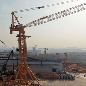 DAHAN 18ton CTL320(6032) Luffing Jib <b>Tower</b> <b>Crane</b> 60m Boom Max Height 211m Featuring PLC Motor Core for Sale - Product Image 1