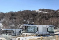 Capsule spatiale modulaire pliable haut de gamme et minimaliste, hôtel préfabriqué, mini-maison mobile pour le glamping, les parcs, les séjours à la maison d'hôtes et les complexes hôteliers