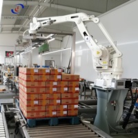 Palettiseur robotisé à fonctionnement continu 24H avec servomoteur et boîte de vitesses PLC pour la manutention de palettes de cartons de boissons et de produits surgelés en entrepôt frigorifique