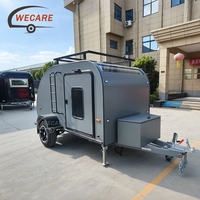Roulotte de camping autonome Wecare avec cuisine extérieure, remorquable par SUV pour le camping hors réseau