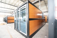 Maison conteneur plate OEM/ODM personnalisée de 20 pieds, maisonnette préfabriquée moderne, cabane préfabriquée durable en acier galvanisé, déploiement rapide