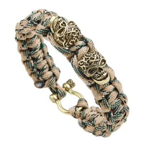 2023 wholesale handmade paracord rope outdoor bracelet punk double skeleton head beads bracelet with screw clasp