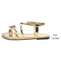 Sandales plates à nœud métallique style européen et américain, grande taille, nouvelle collection A64, chaussures de plage tendance avec chaîne de cheville pour l'été