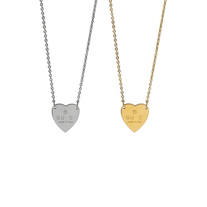 <span class=keywords><strong>Collana</strong></span> con Ciondolo a Cuore con <span class=keywords><strong>Lettera</strong></span> <span class=keywords><strong>G</strong></span> Incisa in Acciaio al Titanio, Design Ispirato - Product Image 1