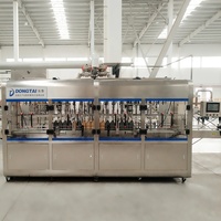Équipement de remplissage spécialisé pour l'industrie chimique certifié CE, ligne de production de remplissage de lubrifiants entièrement automatique