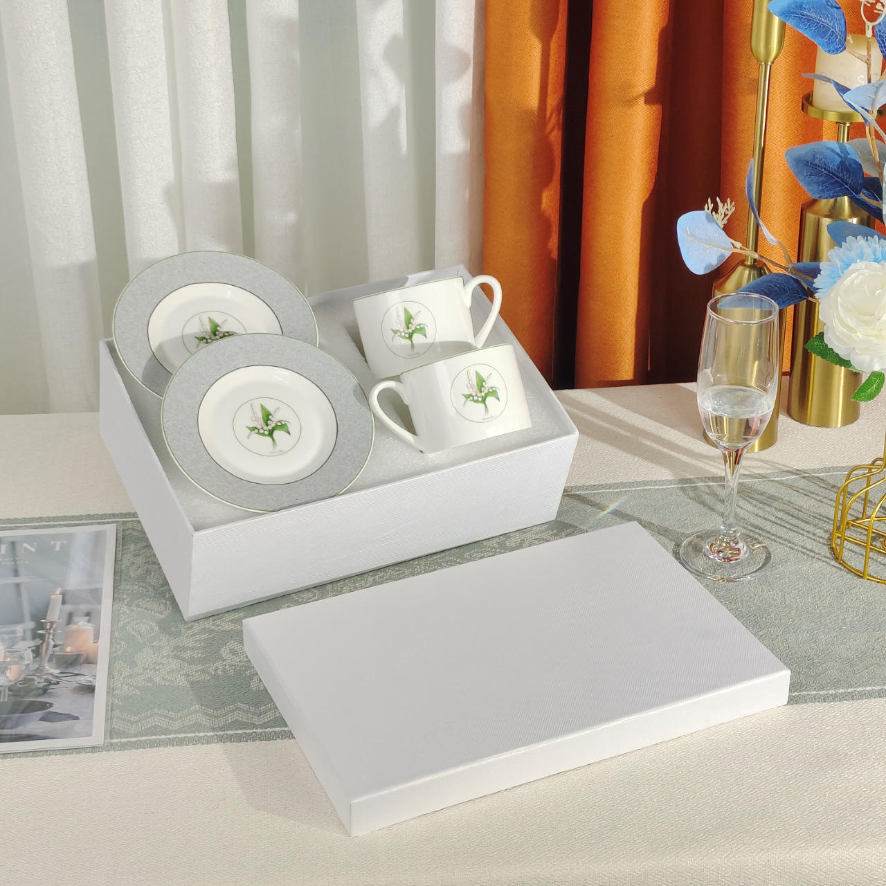 white-double cup and saucer