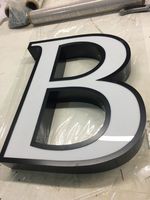 Letra de canal de metal luminosa frontal personalizada con tapa embellecedora Letrero de canal de metal LED para negocios