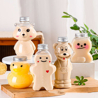 Bouteilles de jus de boisson en plastique jetables transparentes en gros, forme d'animal de dessin animé créative, avec couvercle en aluminium