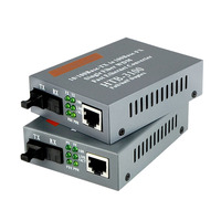 Gigabit Fiber dönüştürücü 10/100/1000M Fiber ortam dönüştürücü 100m SC RJ45 optik alıcı-verici FTTH Simplex DC 5V Powered 1 yıl