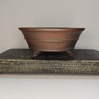 Vente flash : Pot à bonsaï rond de style antique avec design lignes et pieds nuage