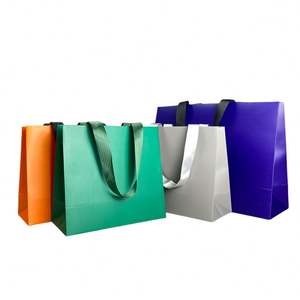 Sacs d'emballage en papier blanc écologiques et bon marché imprimés au prix de gros KM avec poignée noire - Product Image 1