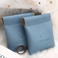 Sac tendance en cuir Pu avec logo design personnalisé haut de gamme pour écouteurs bijoux bague collier sac à poussière en cuir pièce de monnaie avec feuille de fer